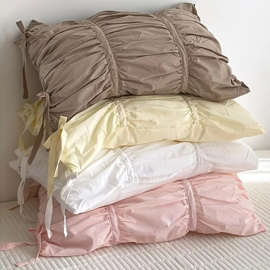 FLITTERED PILLOWS